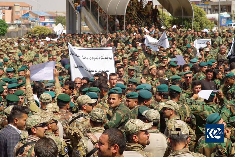 Peshmerga, security, and police forces protest in Sulaimani against Iraqi Parliament's decision to void their votes, June 13, 2018. (Photo: Kurdistan 24/Ibrahim Fatah)